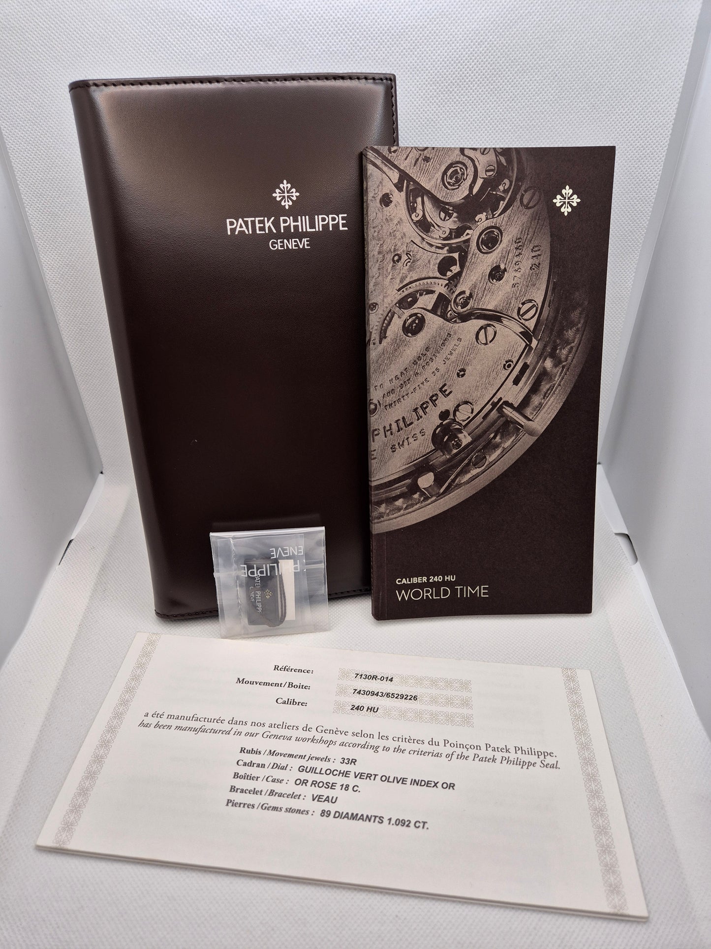 Patek Philippe World Time 7130G-016 'Blue Guilloché Diamond Bezel'