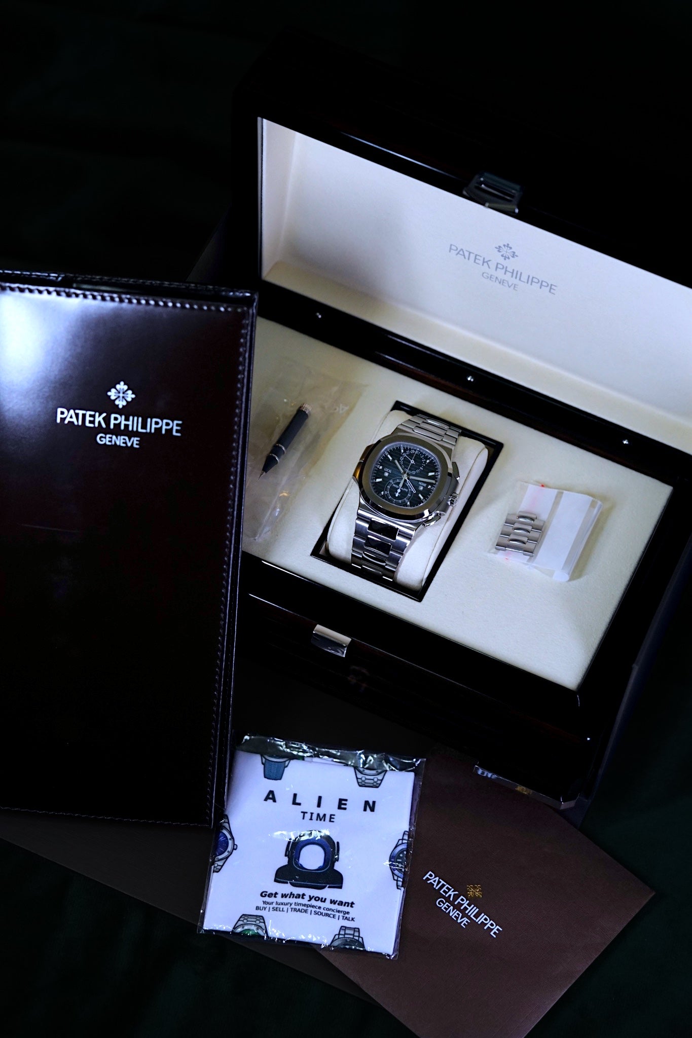 Patek Philippe Nautilus | Ref 5990/1a-011 | A Blue Dial Steel Travel Time Chronograph Complication Wristwatch