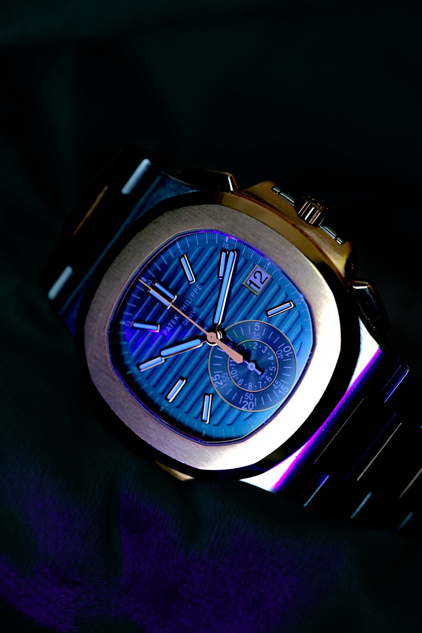 Patek Philippe Nautilus Chronograph Ref. 5980/1ar-001 | A Rare and Highly Attractive Stainless Steel and 18k Pink Gold Automatic Flyback Chronograph Wristwatch in Complete Set