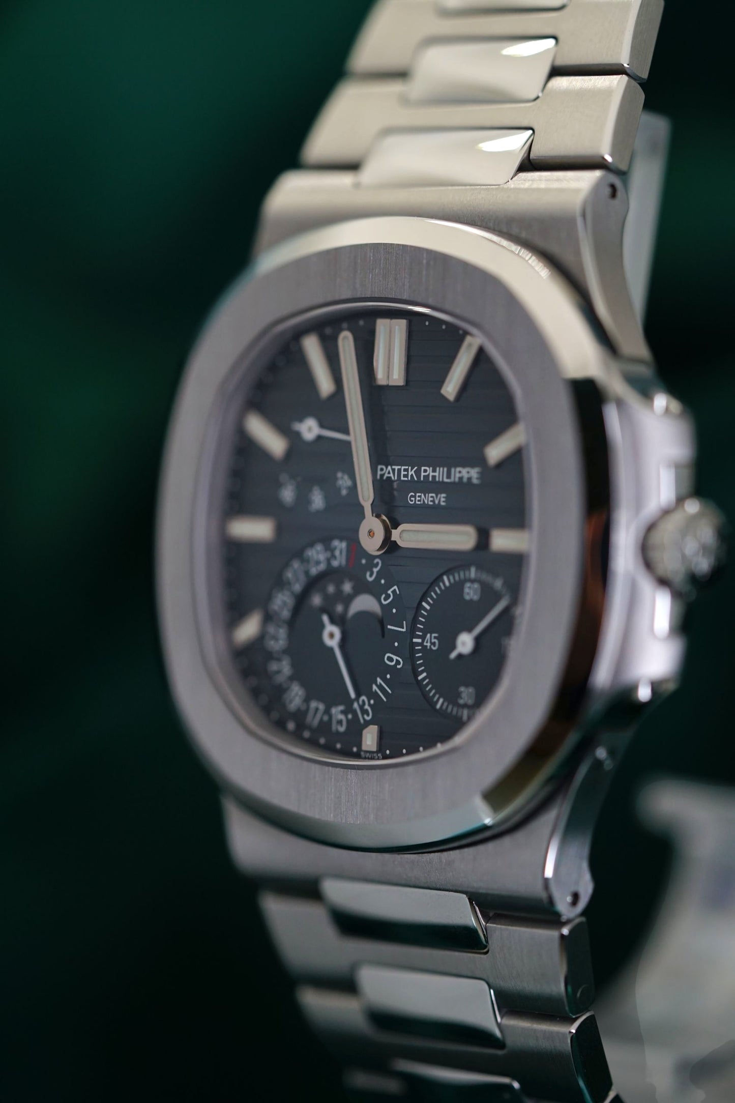 Patek Philippe Nautilus Stainless Steel 5712/1A-001 Discontinued a RARE Moonphase & Date Blue Dial watch in Full Set