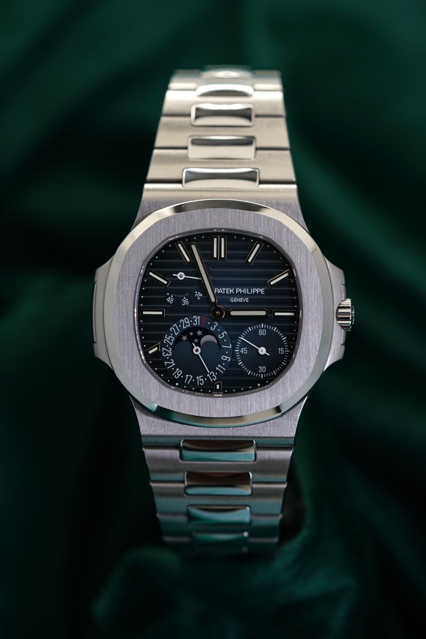 Patek Philippe Nautilus Stainless Steel 5712/1A-001 Discontinued a RARE Moonphase & Date Blue Dial watch in Full Set