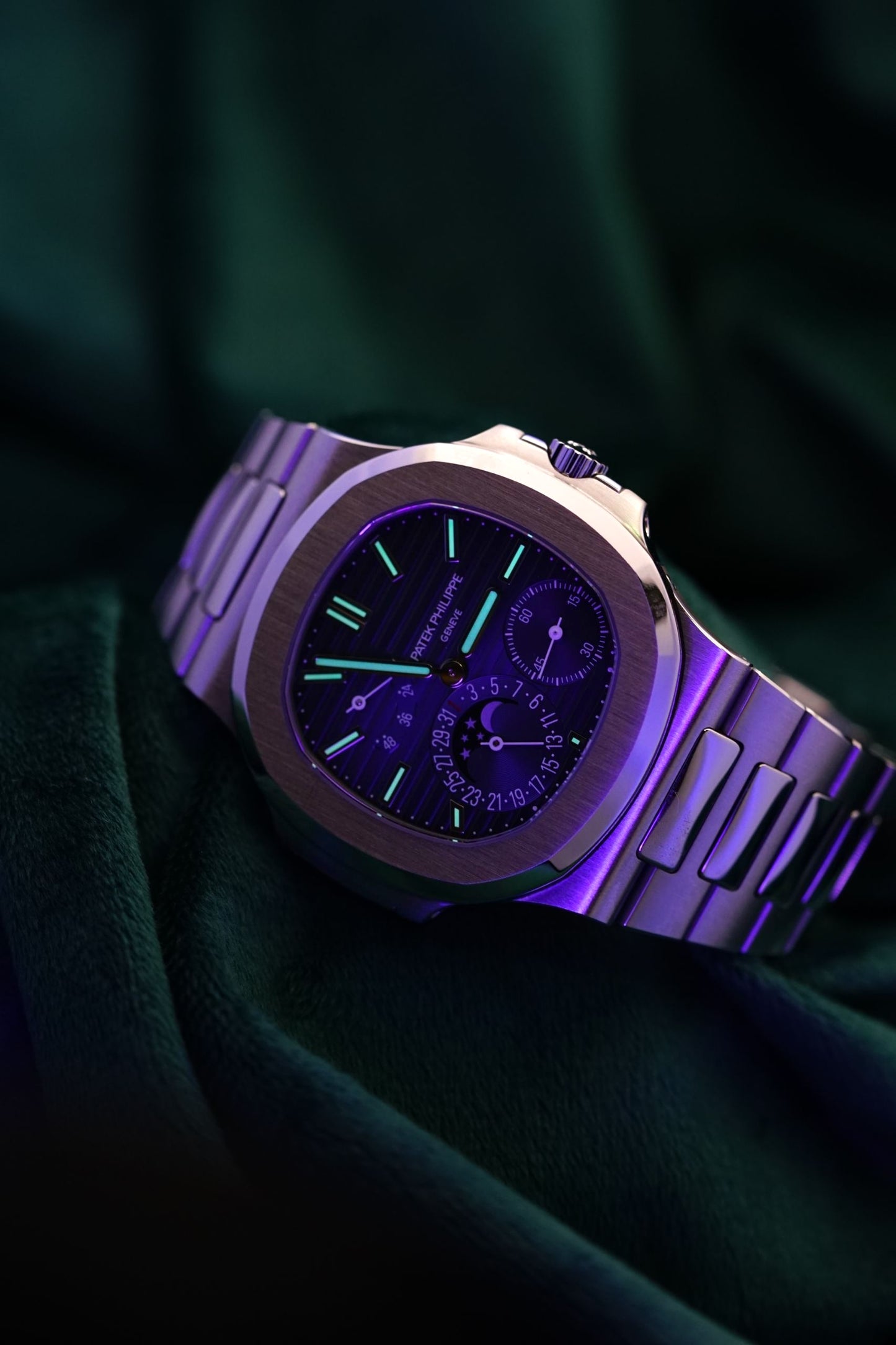 Patek Philippe Nautilus Stainless Steel 5712/1A-001 Discontinued a RARE Moonphase & Date Blue Dial watch in Full Set