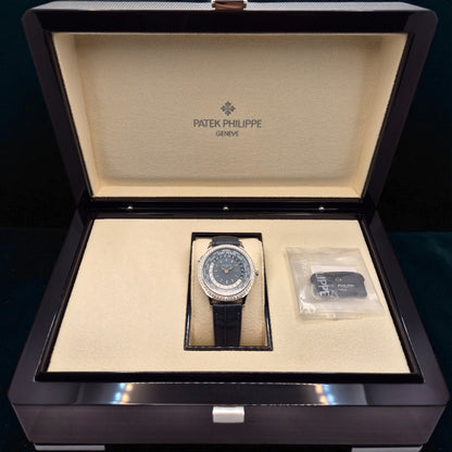 Patek Philippe World Time, Ref. 7130g | a Rare White Gold and Diamond-set Ladies' World Time Wristwatch