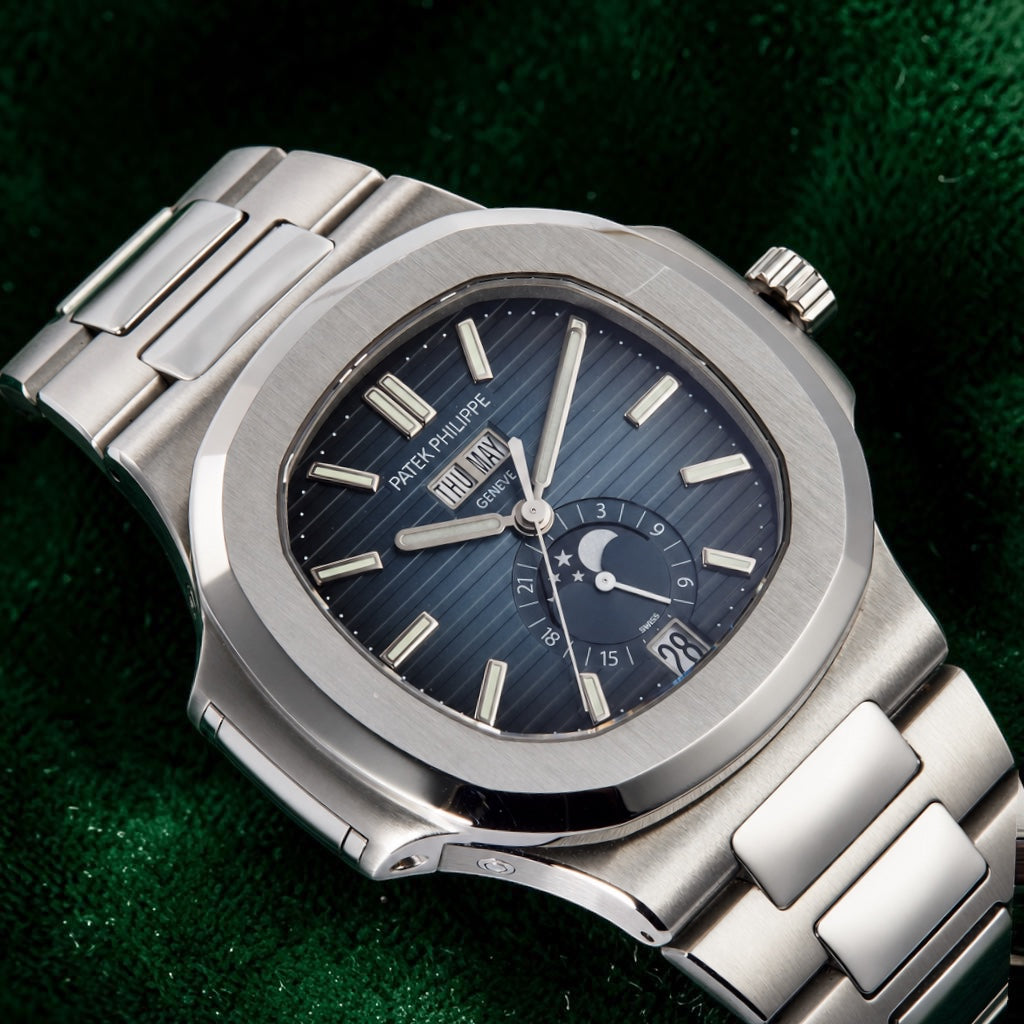 Patek Philippe Nautilus | Reference 5726/1a | A Blue Dial Stainless Steel Annual Calendar Moonphase Wristwatch