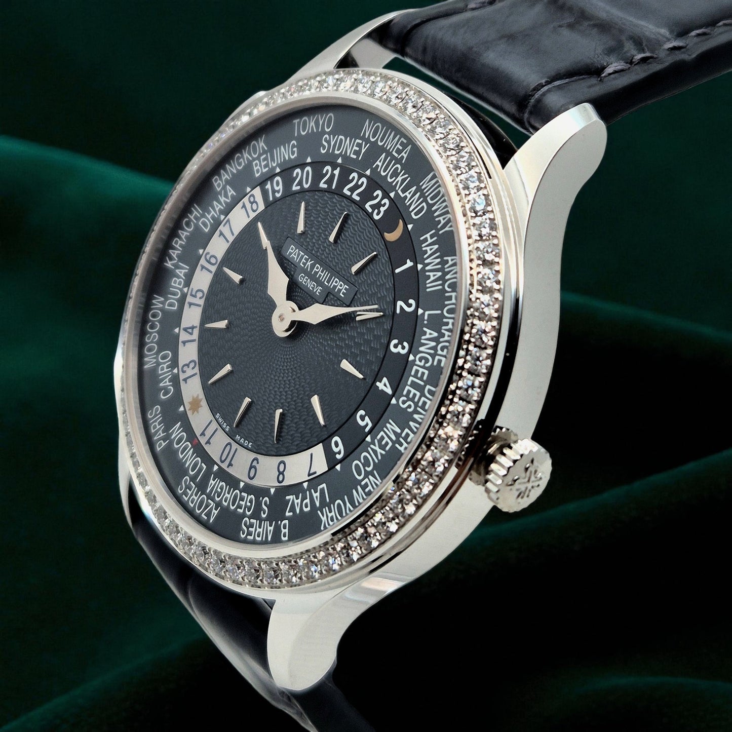 Patek Philippe World Time, Ref. 7130g | a Rare White Gold and Diamond-set Ladies' World Time Wristwatch