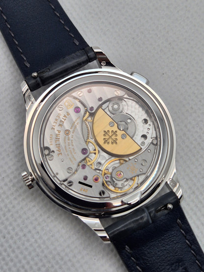 Patek Philippe World Time 7130G-016 'Blue Guilloché Diamond Bezel'