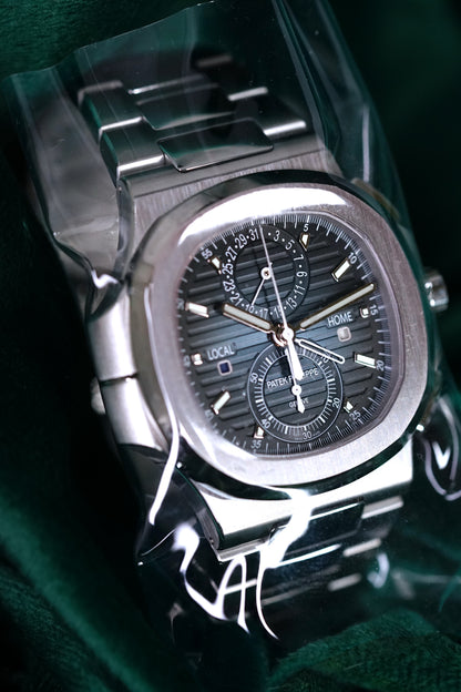 NEW PATEK PHILIPPE NAUTILUS 5990/1A-011 | STEEL TRAVEL TIME CHRONOGRAPH | SUNBURST BLUE DIAL | Q4 2025 COMPLETE SET