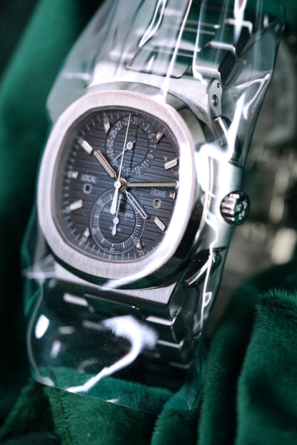 NEW PATEK PHILIPPE NAUTILUS 5990/1A-011 | STEEL TRAVEL TIME CHRONOGRAPH | SUNBURST BLUE DIAL | Q4 2025 COMPLETE SET