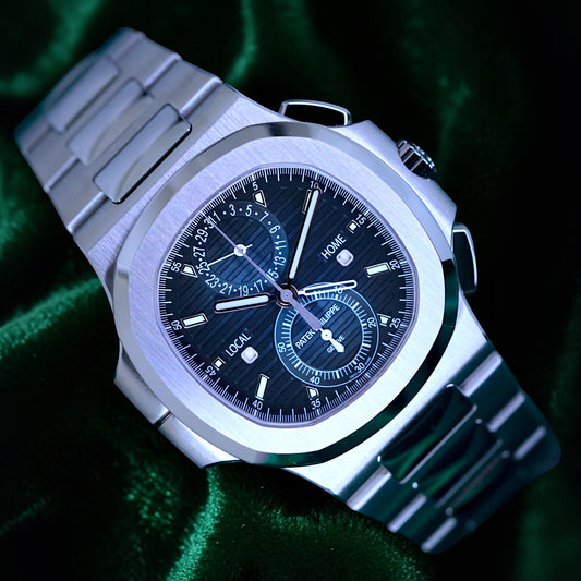 Patek Philippe Nautilus | Ref 5990/1a-011 | A Blue Dial Steel Travel Time Chronograph Complication Wristwatch