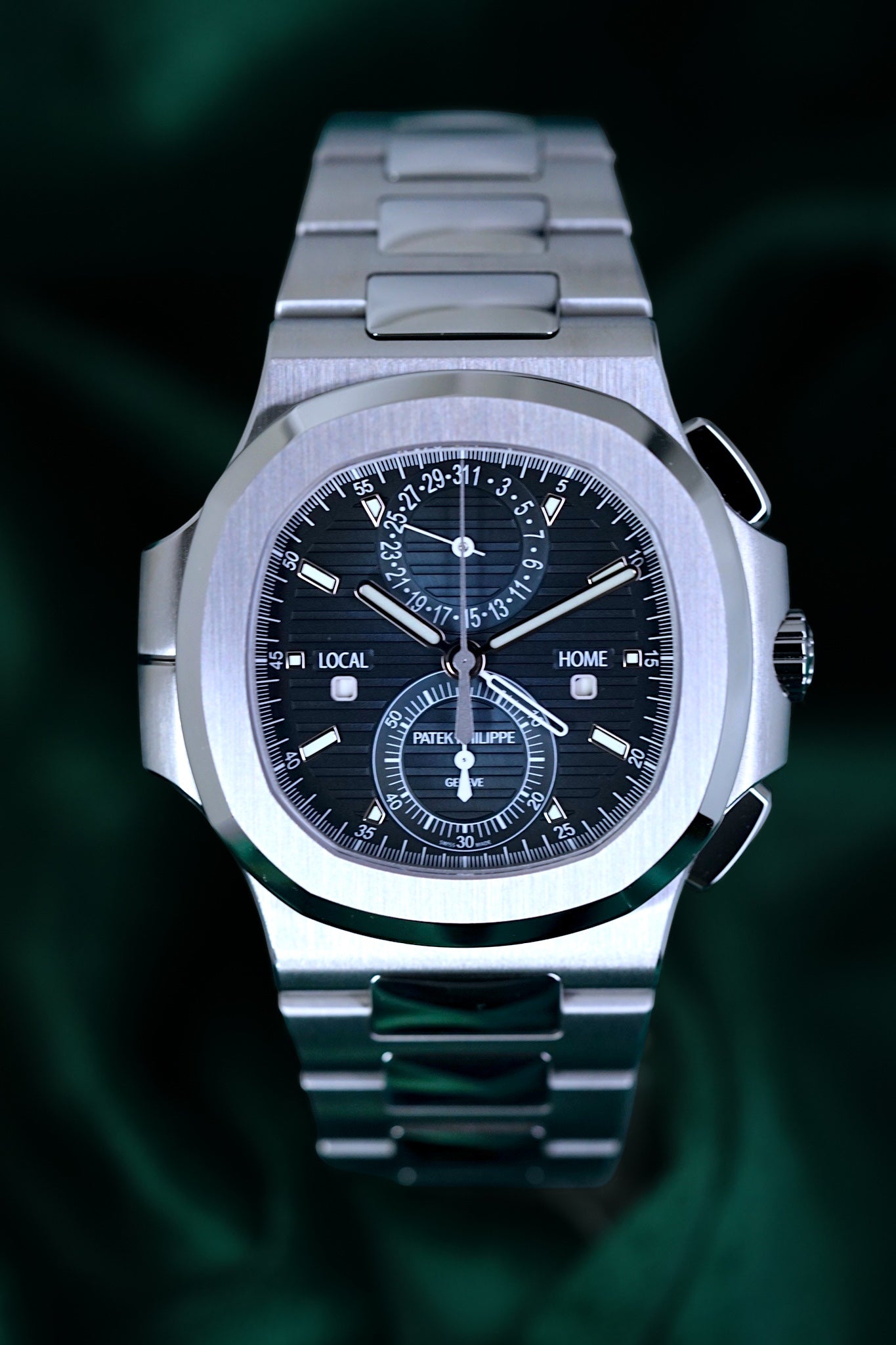Patek Philippe Nautilus | Ref 5990/1a-011 | A Blue Dial Steel Travel Time Chronograph Complication Wristwatch