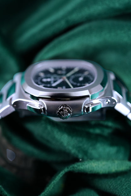 Patek Philippe Nautilus | Ref 5990/1a-011 | A Blue Dial Steel Travel Time Chronograph Complication Wristwatch