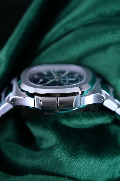 Patek Philippe Nautilus | Ref 5990/1a-011 | A Blue Dial Steel Travel Time Chronograph Complication Wristwatch