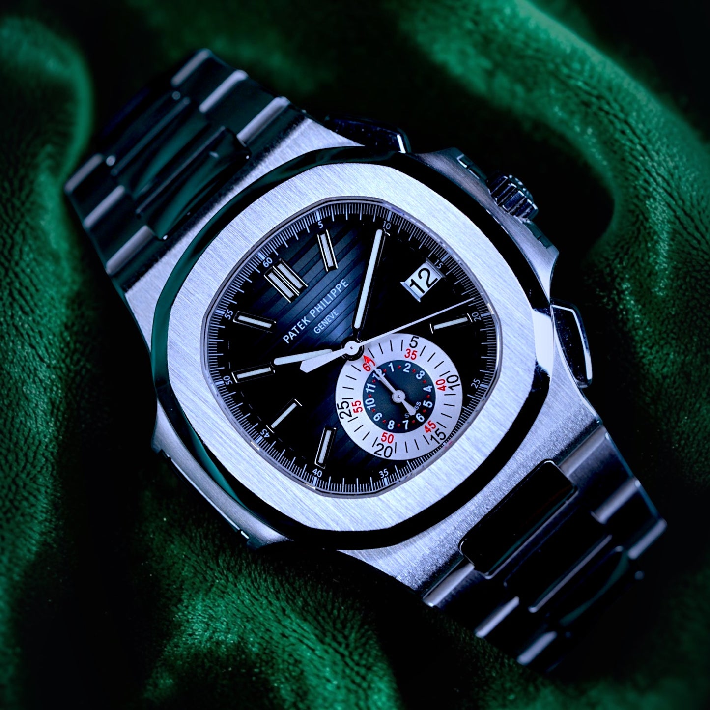 Patek Philppe Nautilus | Ref 5980/1a-001 | A Blue Dial Stainless Steel Flyback Chronograph Wristwatch