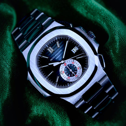 Patek Philppe Nautilus | Ref 5980/1a-001 | A Blue Dial Stainless Steel Flyback Chronograph Wristwatch
