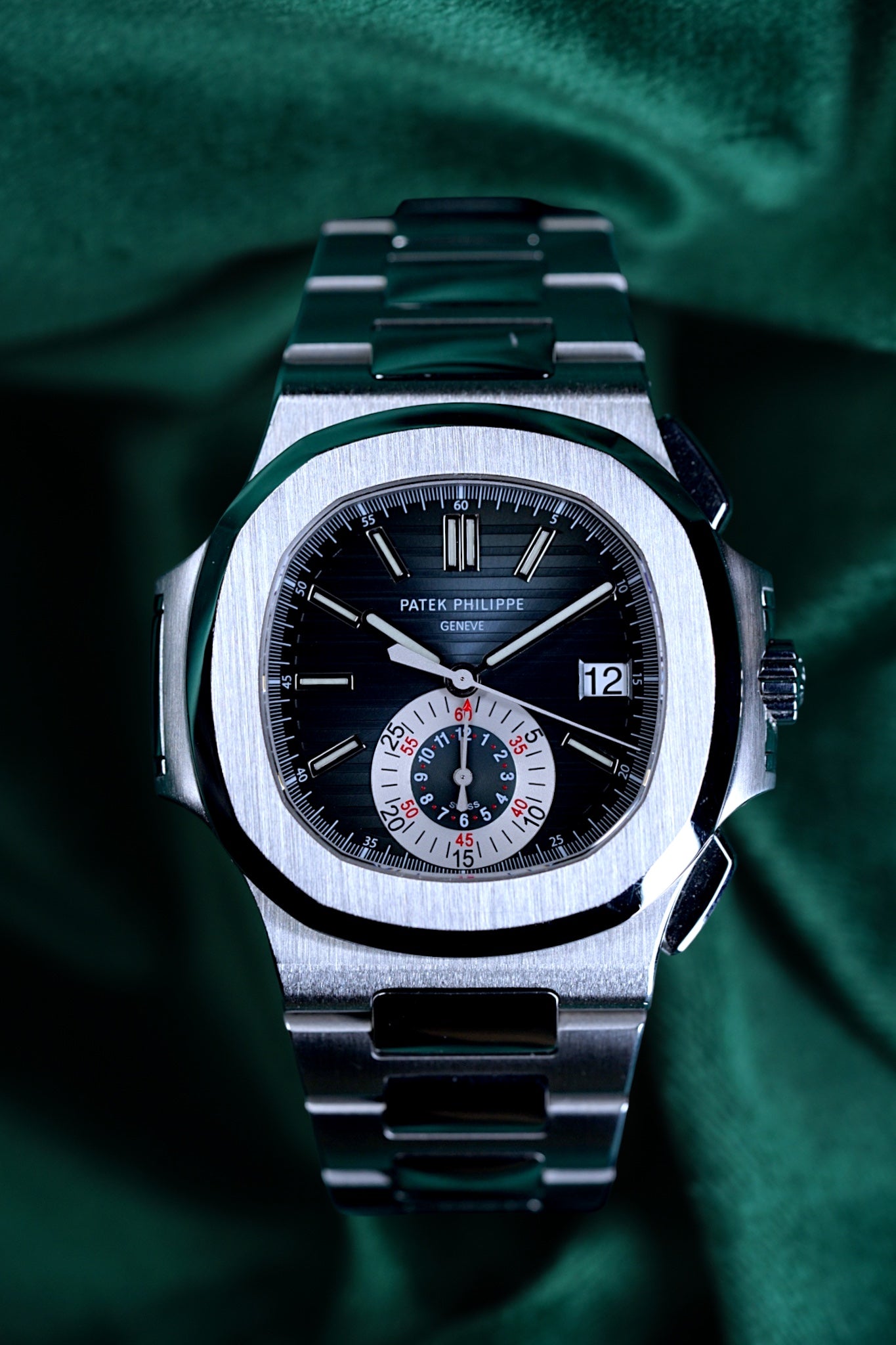 Patek Philppe Nautilus | Ref 5980/1a-001 | A Blue Dial Stainless Steel Flyback Chronograph Wristwatch