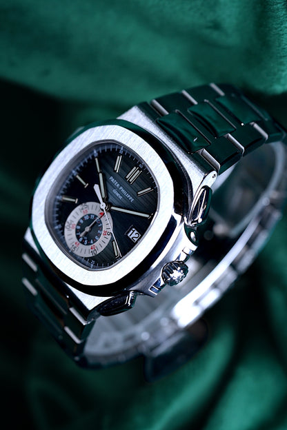 Patek Philppe Nautilus | Ref 5980/1a-001 | A Blue Dial Stainless Steel Flyback Chronograph Wristwatch