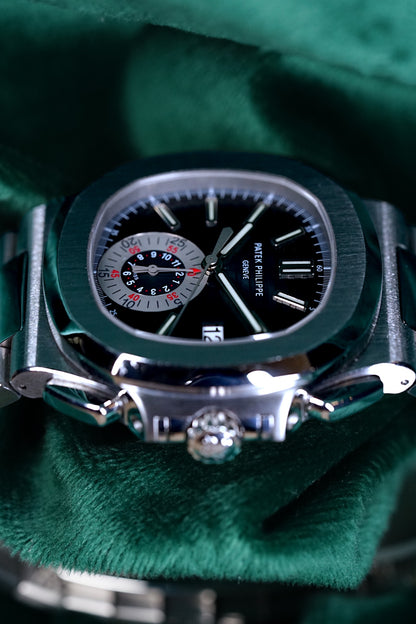 Patek Philppe Nautilus | Ref 5980/1a-001 | A Blue Dial Stainless Steel Flyback Chronograph Wristwatch
