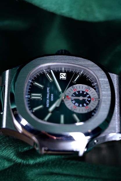 Patek Philppe Nautilus | Ref 5980/1a-001 | A Blue Dial Stainless Steel Flyback Chronograph Wristwatch