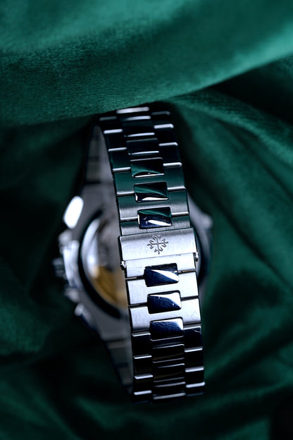 Patek Philppe Nautilus | Ref 5980/1a-001 | A Blue Dial Stainless Steel Flyback Chronograph Wristwatch