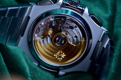 Patek Philppe Nautilus | Ref 5980/1a-001 | A Blue Dial Stainless Steel Flyback Chronograph Wristwatch