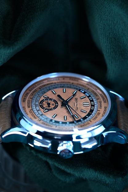 Patek Philippe Wordtimer | Ref 5935A-001 | A Salmon Dial Stainless Steel Flyback Chronograph World Time Comlication Wristwatch