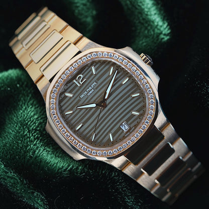 Patek Philippe Ladies Nautilus | Ref 7118/1200R-010 | A 18k Rose Gold Diamond Date Wristwatch