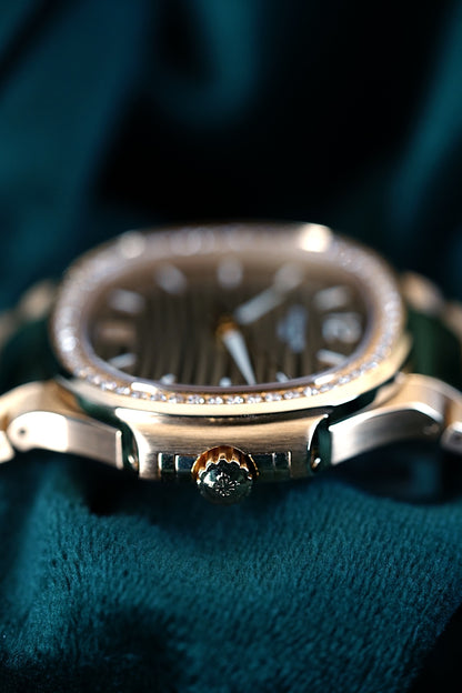 Patek Philippe Ladies Nautilus | Ref 7118/1200R-010 | A 18k Rose Gold Diamond Date Wristwatch