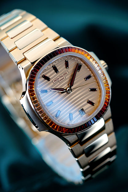 Patek Philippe Nautilus | Ref 7118/1300R-001 | A Rose Gold Gem Set Joaillerie "Rainbow" Date Wristwatch