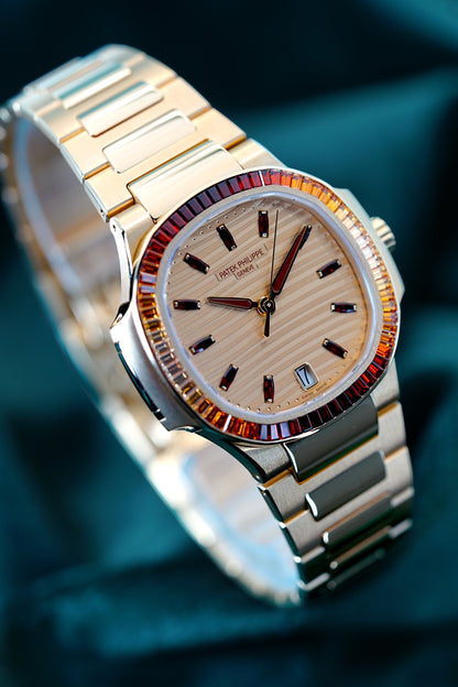 Patek Philippe Nautilus | Ref 7118/1300R-001 | A Rose Gold Gem Set Joaillerie "Rainbow" Date Wristwatch