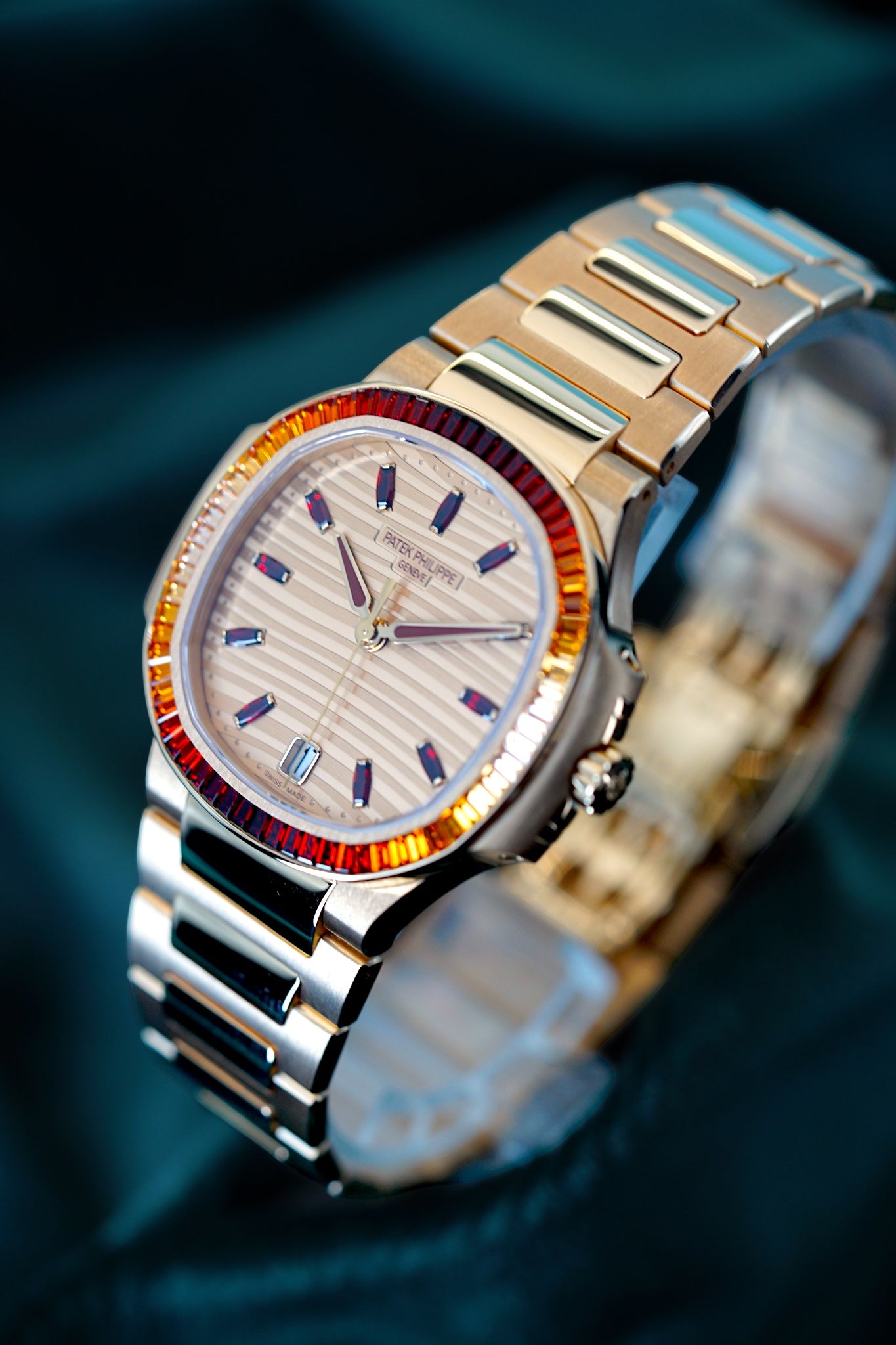 Patek Philippe Nautilus | Ref 7118/1300R-001 | A Rose Gold Gem Set Joaillerie "Rainbow" Date Wristwatch