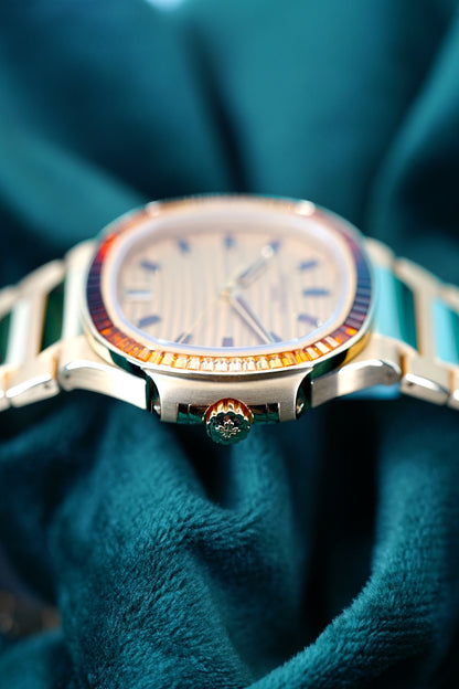 Patek Philippe Nautilus | Ref 7118/1300R-001 | A Rose Gold Gem Set Joaillerie "Rainbow" Date Wristwatch