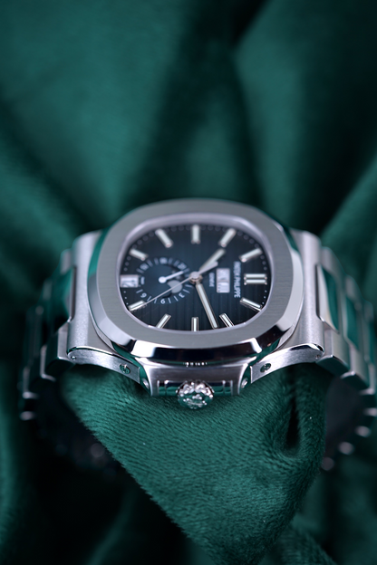 Patek Philippe Nautilus | Reference 5726/1a | A Blue Dial Stainless Steel Annual Calendar Moonphase Wristwatch