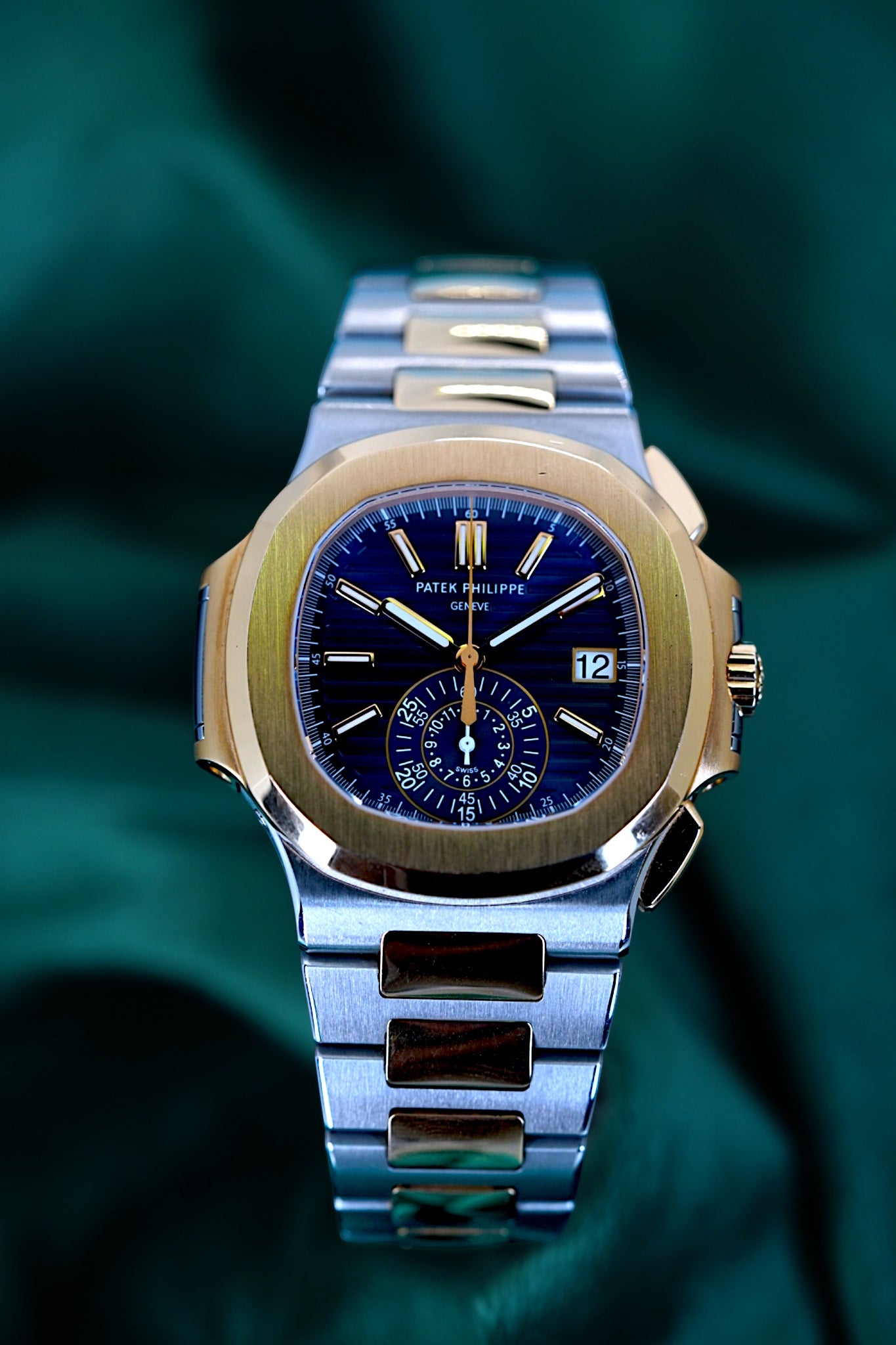 Patek Philippe Nautilus Chronograph Ref. 5980/1ar-001 | A Rare and Highly Attractive Stainless Steel and 18k Pink Gold Automatic Flyback Chronograph Wristwatch in Complete Set