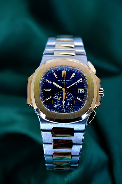 Patek Philippe Nautilus Chronograph Ref. 5980/1ar-001 | A Rare and Highly Attractive Stainless Steel and 18k Pink Gold Automatic Flyback Chronograph Wristwatch in Complete Set