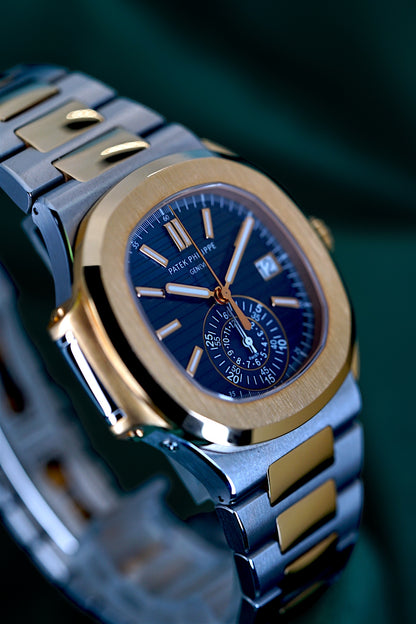 Patek Philippe Nautilus Chronograph Ref. 5980/1ar-001 | A Rare and Highly Attractive Stainless Steel and 18k Pink Gold Automatic Flyback Chronograph Wristwatch in Complete Set