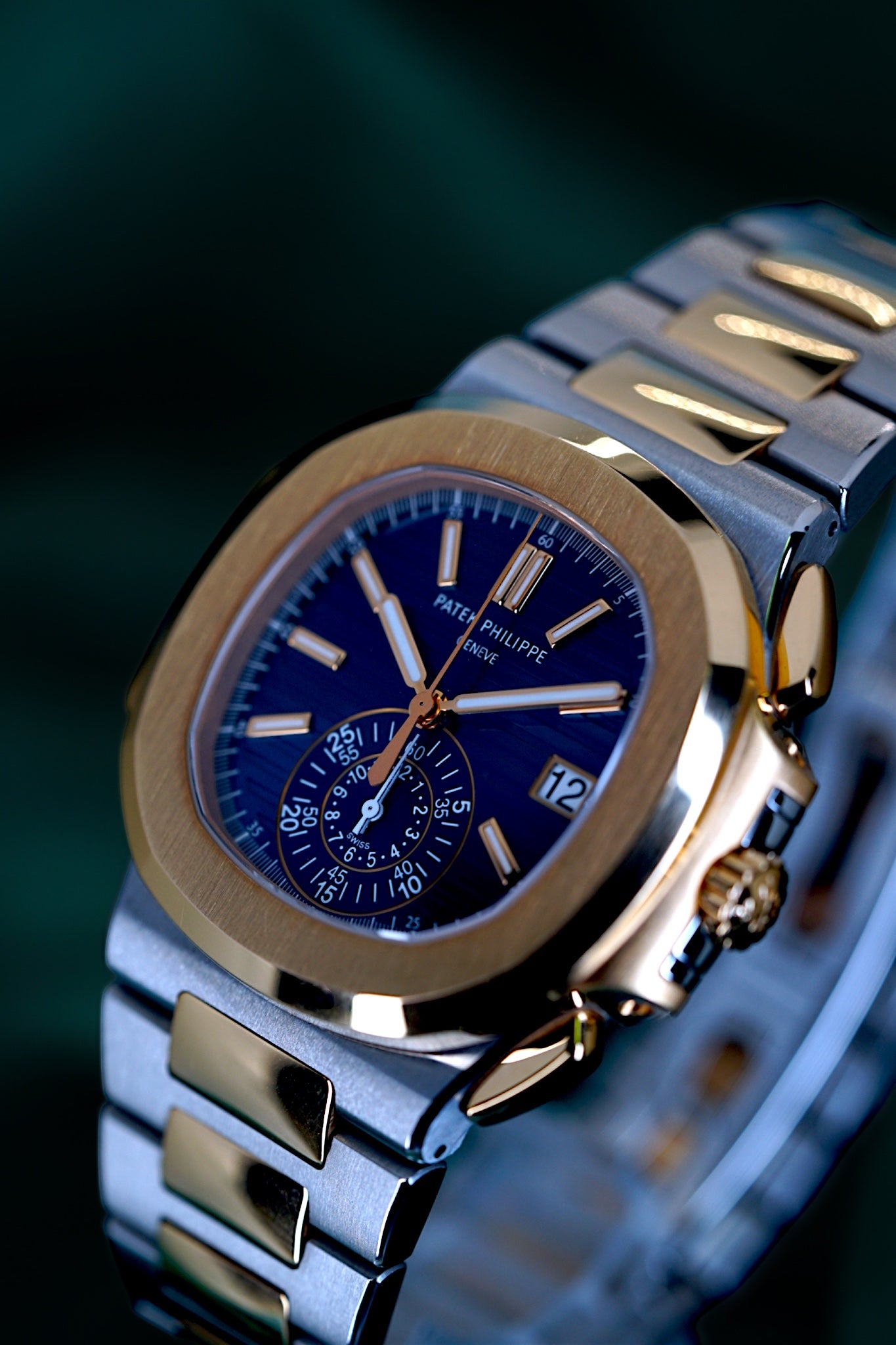 Patek Philippe Nautilus Chronograph Ref. 5980/1ar-001 | A Rare and Highly Attractive Stainless Steel and 18k Pink Gold Automatic Flyback Chronograph Wristwatch in Complete Set