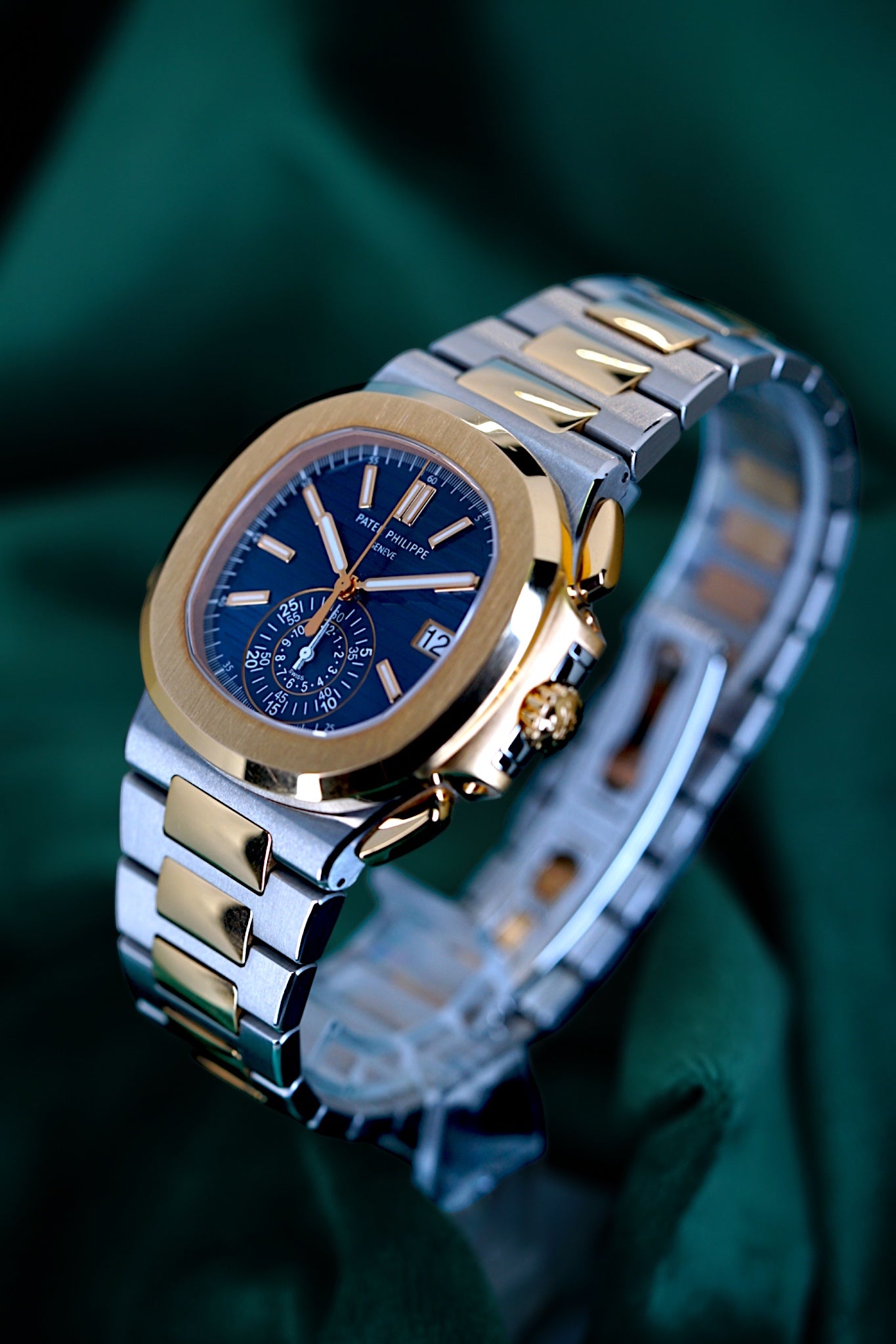 Patek Philippe Nautilus Chronograph Ref. 5980/1ar-001 | A Rare and Highly Attractive Stainless Steel and 18k Pink Gold Automatic Flyback Chronograph Wristwatch in Complete Set