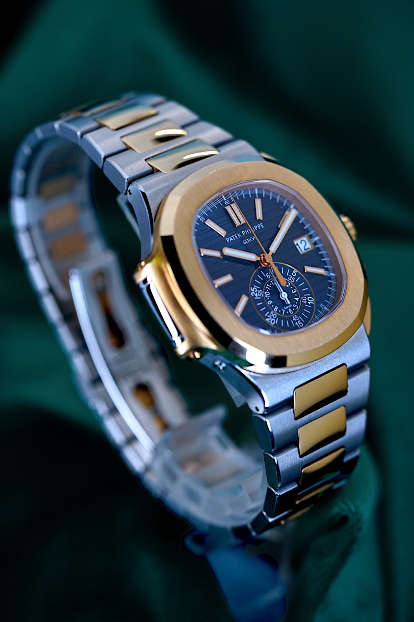 Patek Philippe Nautilus Chronograph Ref. 5980/1ar-001 | A Rare and Highly Attractive Stainless Steel and 18k Pink Gold Automatic Flyback Chronograph Wristwatch in Complete Set