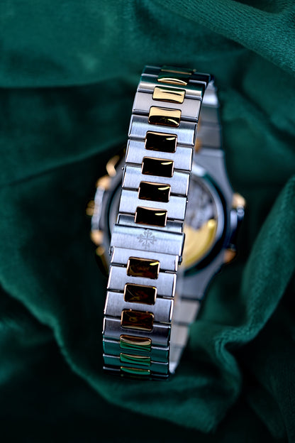 Patek Philippe Nautilus Chronograph Ref. 5980/1ar-001 | A Rare and Highly Attractive Stainless Steel and 18k Pink Gold Automatic Flyback Chronograph Wristwatch in Complete Set