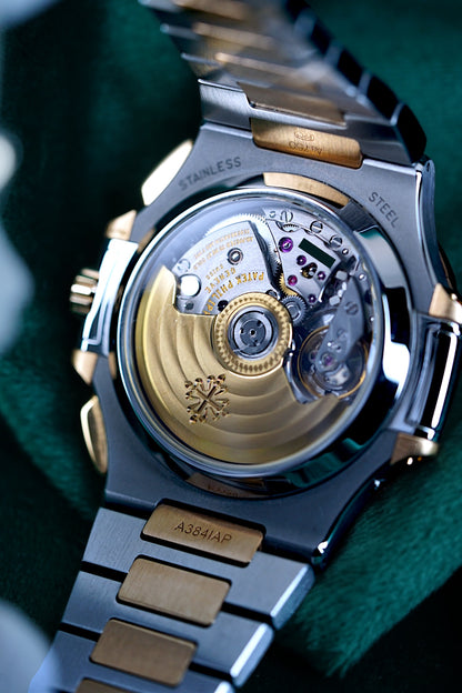 Patek Philippe Nautilus Chronograph Ref. 5980/1ar-001 | A Rare and Highly Attractive Stainless Steel and 18k Pink Gold Automatic Flyback Chronograph Wristwatch in Complete Set