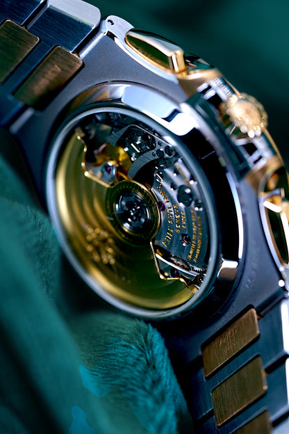 Patek Philippe Nautilus Chronograph Ref. 5980/1ar-001 | A Rare and Highly Attractive Stainless Steel and 18k Pink Gold Automatic Flyback Chronograph Wristwatch in Complete Set