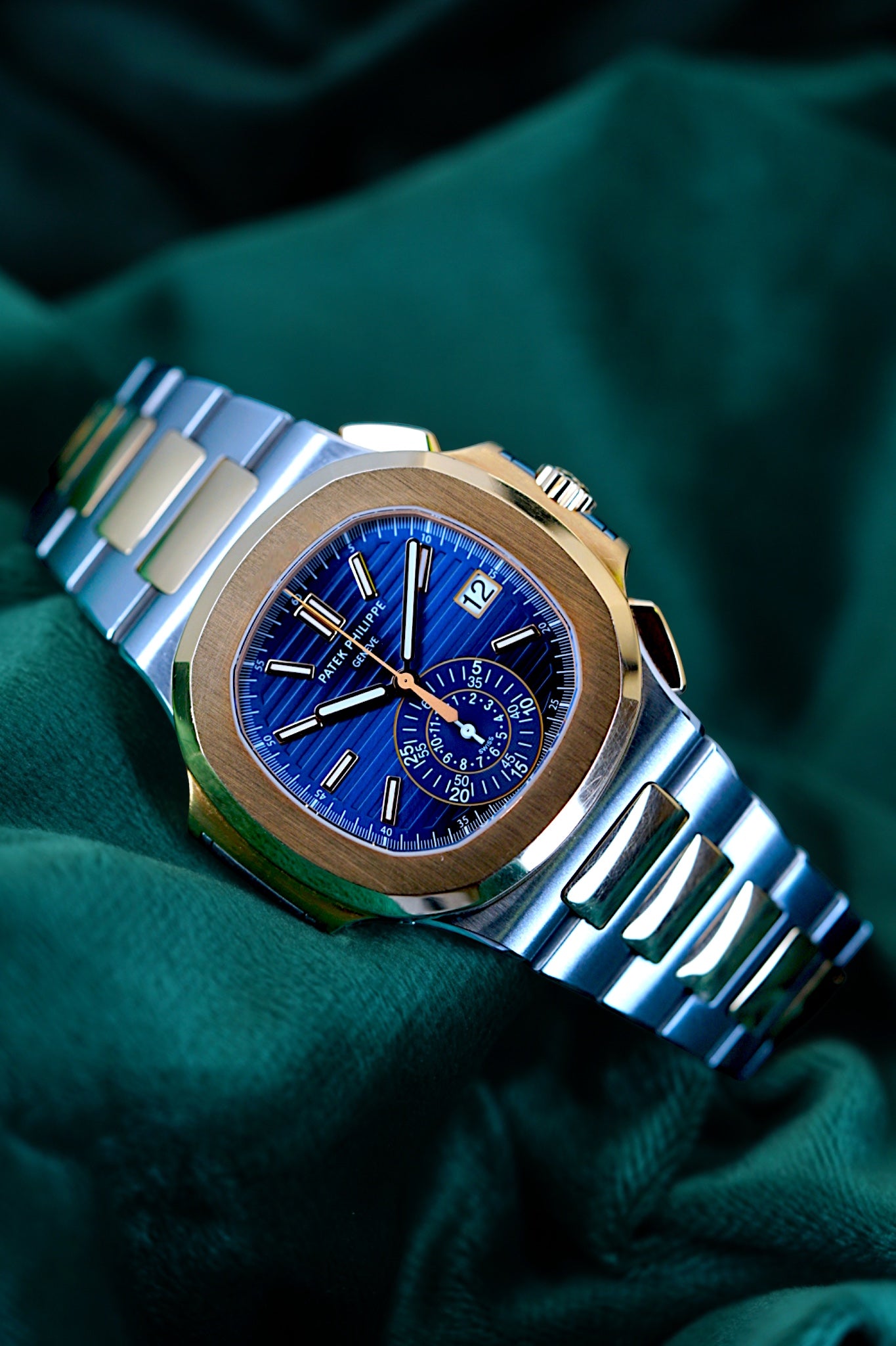 Patek Philippe Nautilus Chronograph Ref. 5980/1ar-001 | A Rare and Highly Attractive Stainless Steel and 18k Pink Gold Automatic Flyback Chronograph Wristwatch in Complete Set