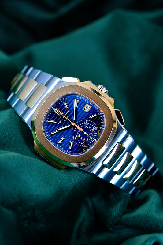 Patek Philippe Nautilus Chronograph Ref. 5980/1ar-001 | A Rare and Highly Attractive Stainless Steel and 18k Pink Gold Automatic Flyback Chronograph Wristwatch in Complete Set
