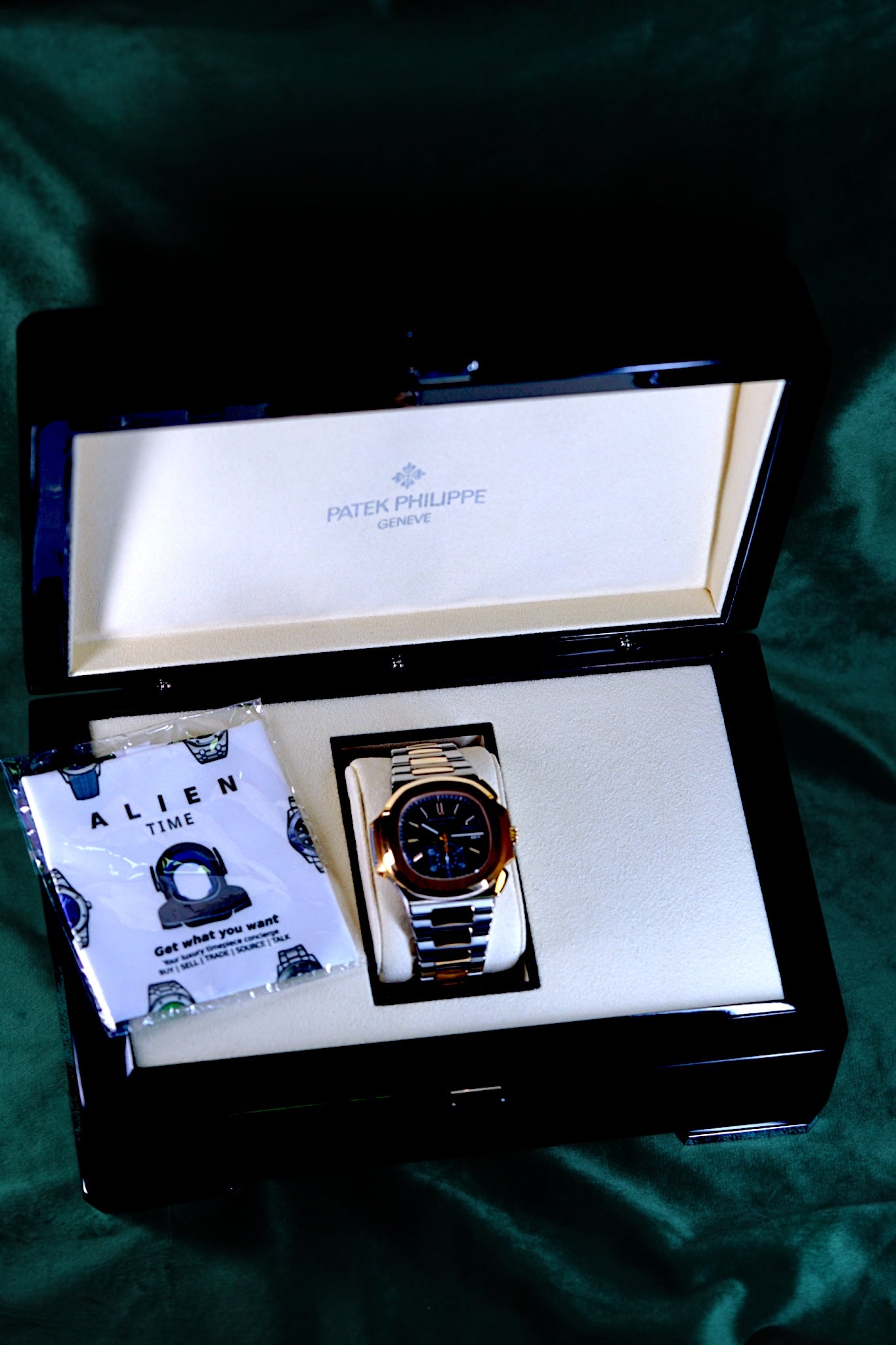 Patek Philippe Nautilus Chronograph Ref. 5980/1ar-001 | A Rare and Highly Attractive Stainless Steel and 18k Pink Gold Automatic Flyback Chronograph Wristwatch in Complete Set