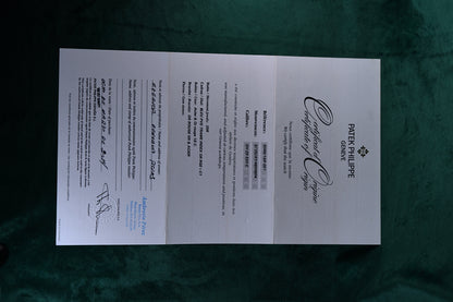 Patek Philippe Nautilus Chronograph Ref. 5980/1ar-001 | A Rare and Highly Attractive Stainless Steel and 18k Pink Gold Automatic Flyback Chronograph Wristwatch in Complete Set