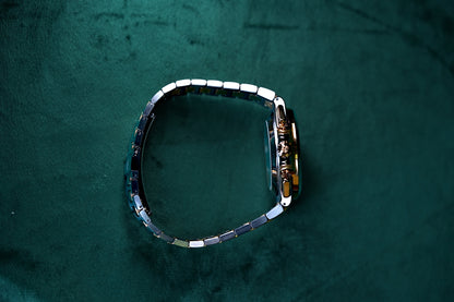 Patek Philippe Nautilus Chronograph Ref. 5980/1ar-001 | A Rare and Highly Attractive Stainless Steel and 18k Pink Gold Automatic Flyback Chronograph Wristwatch in Complete Set