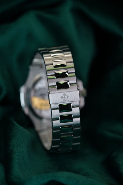 Patek Philippe Nautilus Stainless Steel 5712/1A-001 Discontinued a RARE Moonphase & Date Blue Dial watch in Full Set